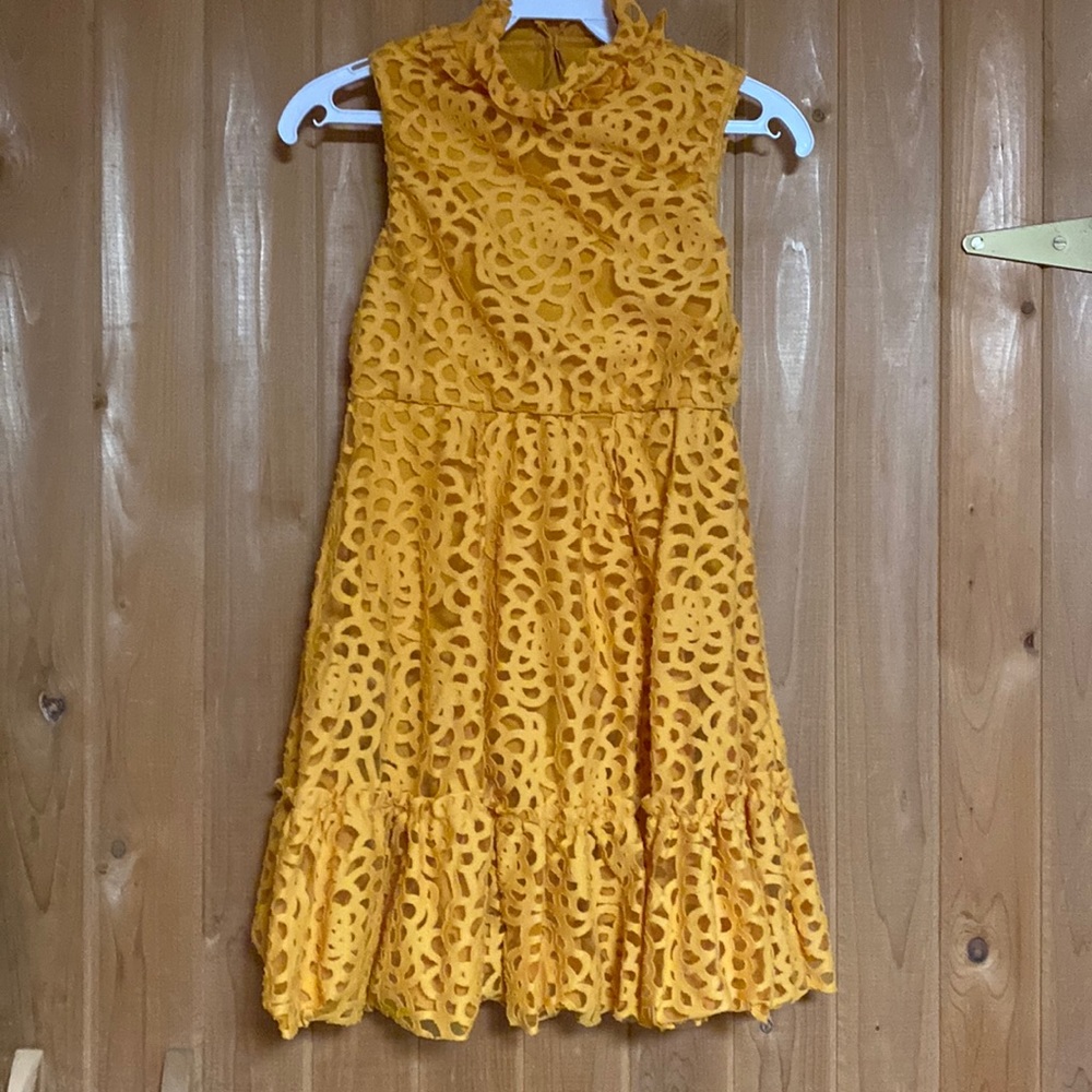 Saffron colored unaltered dance costume